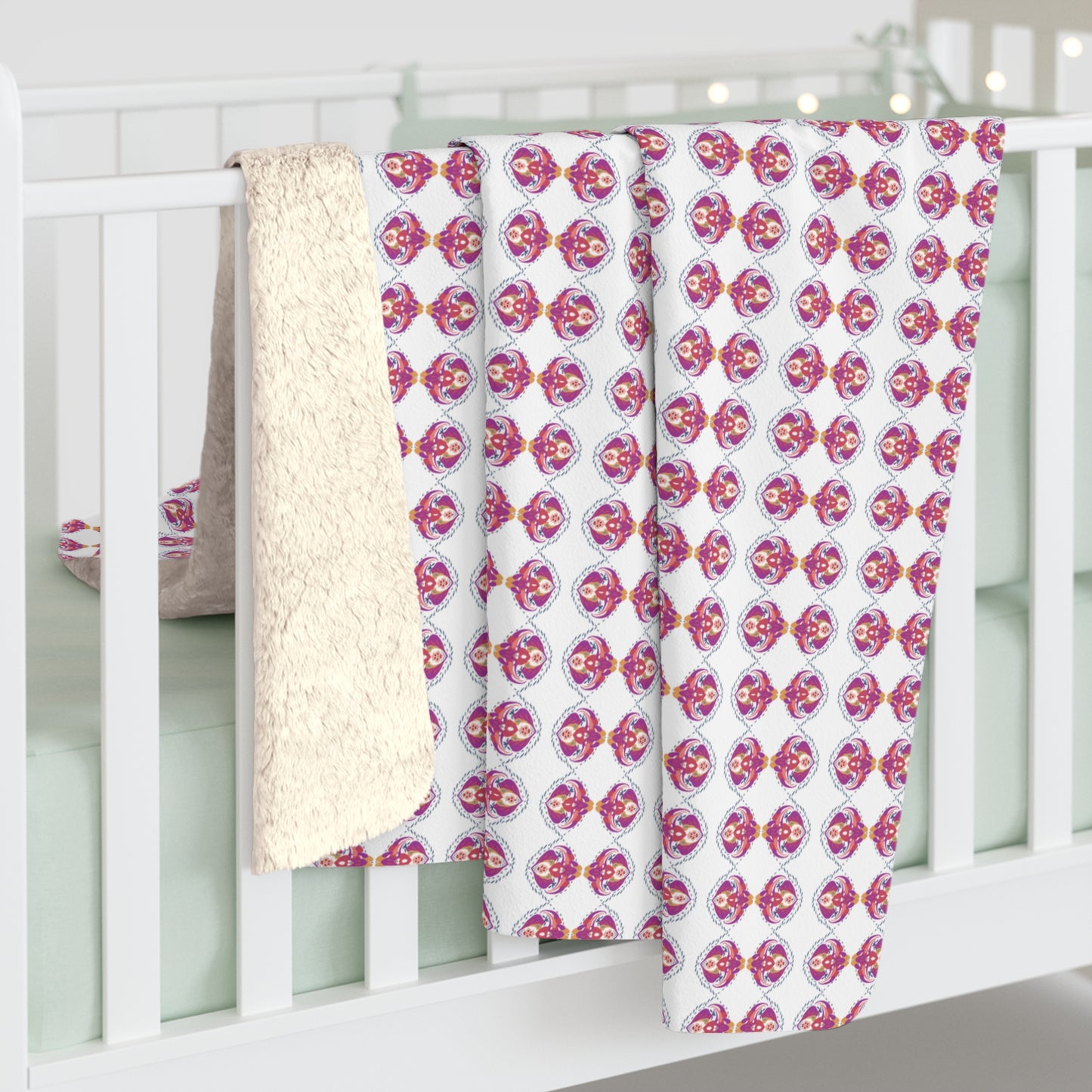 A cozy and luxurious pink and purple motif Sherpa Blanket